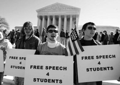 
From left, Luke Remchuk,  Kevin Newcomb  and Jay Hartman demonstrate for students' free-speech rights outside the Supreme Court in Washington on Monday. 
 (Associated Press / The Spokesman-Review)
