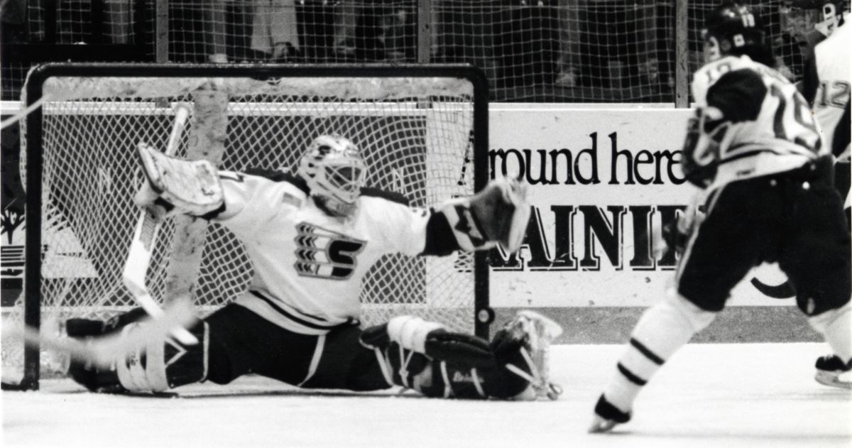 Then: Trevor Kidd, instrumental in Spokane’s 1991 Memorial Cup win, stops a shot against Kamloops in the WHL playoffs. (File)