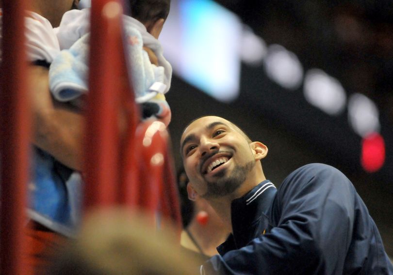 Spokane Shock's Raul Vijil chats with friends on the sidelines before the game against the Cleveland Gladiators on Saturday, March 19, 2011, at the Spokane Arena. Vijil was inactive for the game. (Jesse Tinsley / The Spokesman-Review)