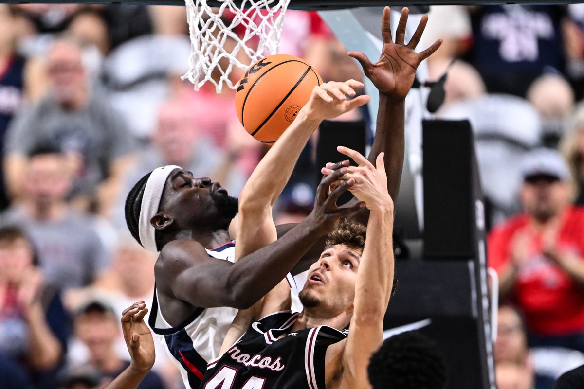 Santa Clara Broncos guard Jake Ensminger (44) battles Gonzaga Bulldogs forward Graham Ike (15) in the paint for a rebound during the first half of the WCC Tournament men’s championship basketball game on Tuesday, Mar 10, 2026, at the Orleans Arena in Las Vegas.  (Tyler Tjomsland/The Spokesman-Review)