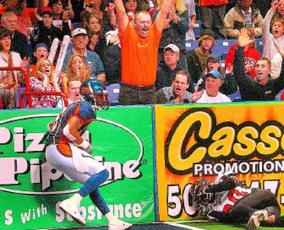 Spokane Shock wide receiver Antwone Savage and fans celebrate a first-half score over Stockton.
(Brian Plonka / The Spokesman-Review)