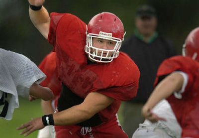 
Ferris High School defensive lineman Cameron Elisara has been getting double-teamed since the third grade.
 (Christopher Anderson/ / The Spokesman-Review)