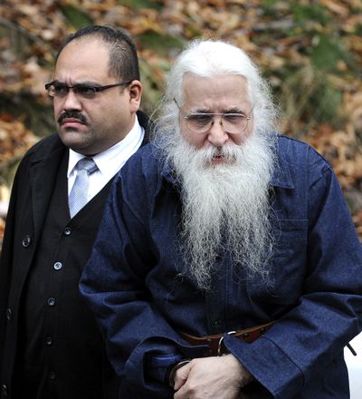 Jose Ramos, right, is escorted by police to his arraignment in Kingston Township, Pa. Wednesday Nov. 7, 2012.  Ramos, a man long considered the prime suspect in the disappearance of New York City boy Etan Patz more than three decades ago was released from a Pennsylvania prison on Wednesday, then immediately arrested on a Megan's Law violation after providing an outdated address of where he would be residing, state police said. (Clark Orden / The Times Leader)