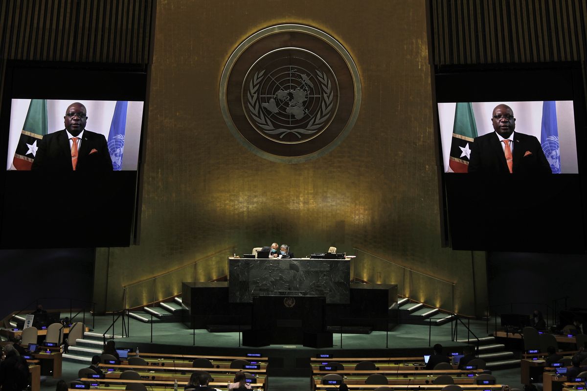 Prime Minister of Saint Kitts and Nevis, Timothy Harris, in a pre-recorded message, addresses the 76th session of the United Nations General Assembly, Friday Sept. 24, 2021, at UN headquarters. At the United Nations General Assembly, African and Caribbean countries that stand to benefit from reparations were backed by other nations, though those most responsible for slavery and colonialism said little about what they might owe to African descendants.  (PETER FOLEY)