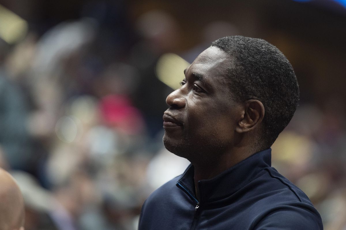 Former NBA player Dikembe Mutombo watches from the Florida State section during Thursday’s Sweet 16 game  at the Honda Center in Anaheim, Calif. (Colin Mulvany / The Spokesman-Review)