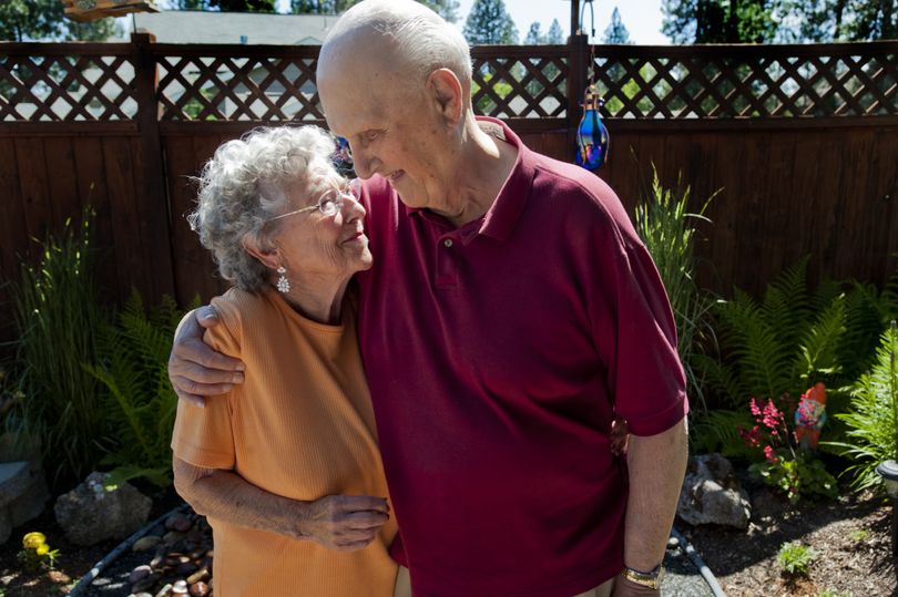 Dale and Eva Eastburg embrace at their home in Mead on June 28, 2012. The Eastburgs celebrated their 70th anniversary in May 2012. He’s 90, she’s 88 and they enjoy going to the gym three days a week. (Tyler Tjomsland)