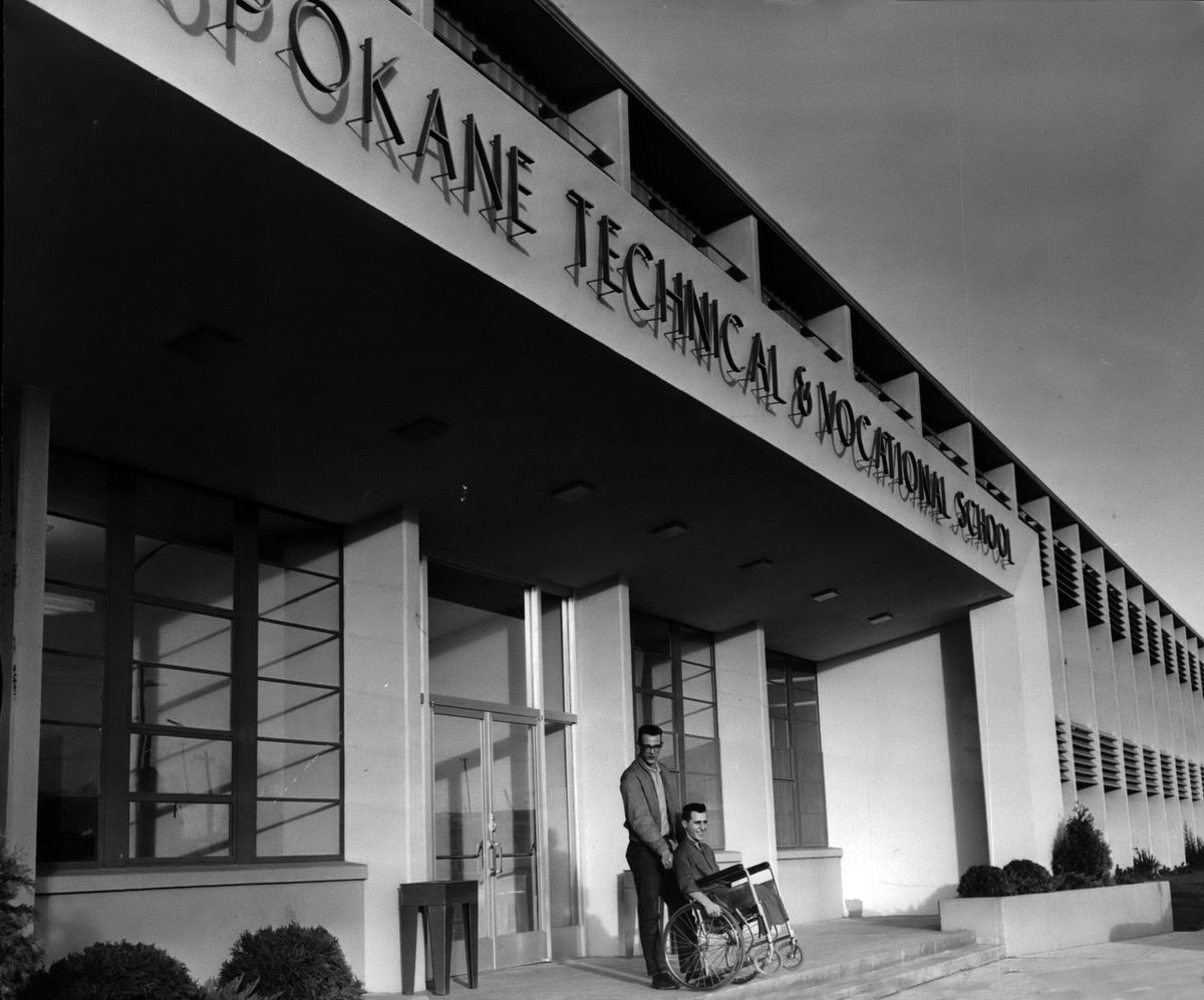 1960: Student Dennis Cornella, 18, sits in his wheelchair on the front steps at Spokane Technical and Vocational School at 3403 E. Mission Ave. After losing both legs in a farming accident in 1958, Cornella enrolled in the watchmaking program at the school, which would become Spokane Community College in 1963. The twin Community Colleges of Spokane, SCC and Spokane Falls Community College, grew out of the demand for job training and college degree programs after World War II.  (Spokesman-Review photo archives)