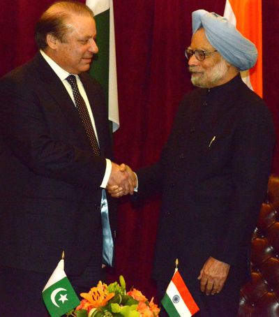 Pakistani Prime Minister Nawaz Sharif, left, and Indian Prime Minister Manmohan Singh meet Sunday. (Associated Press)