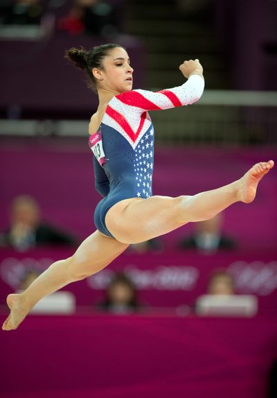 Aly Raisman of United States shows gold-medal form in the women’s floor exercise.
