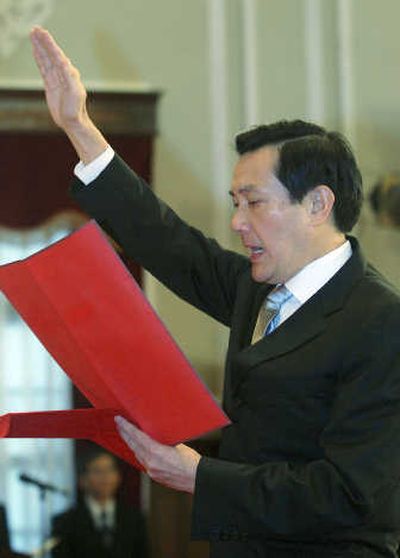 
Taiwan's Nationalist Party President-elect Ma Ying-jeou recites the presidential oath. Associated Press
 (Associated Press / The Spokesman-Review)