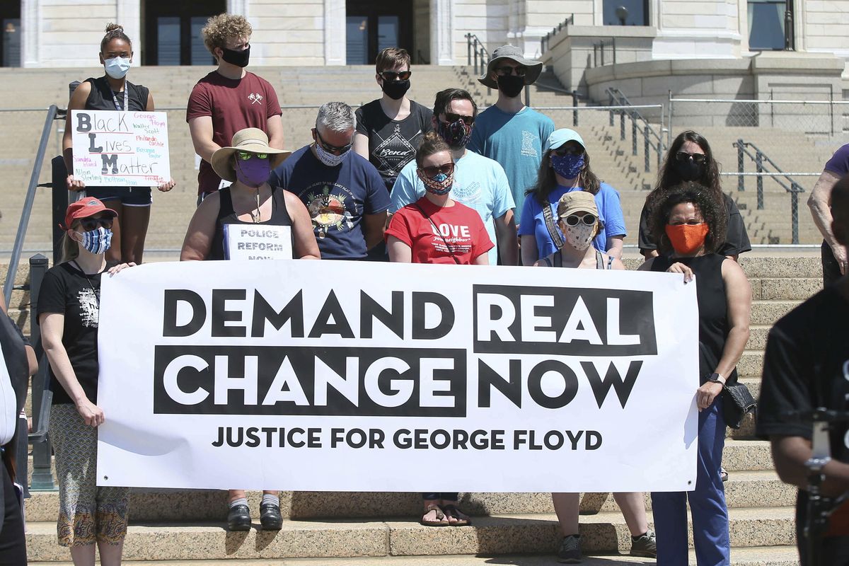 In this June 12, 2020 photo, protesters demanding change in the wake of the death of George Floyd hold a media briefing outside the Minnesota State Capitol, in St. Paul, Minn. Minnesota’s top Democratic and Republican lawmakers reached agreement on the highlights of a public safety bill that includes police accountability measures, a day after former Minneapolis police officer Derek Chauvin was sentenced to 22 1/2 years in prison for the death of Floyd. While some details had yet to be finalized, leaders from both parties said the compromise reached late Saturday, June 26, 2021, settles the major issues after months of negotiations. (Jim Mone)