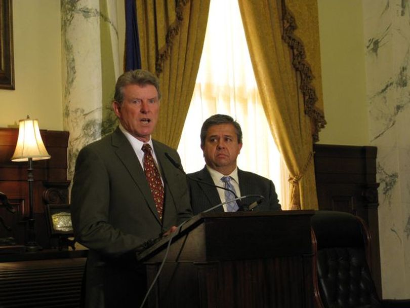 Gov. Butch Otter, left, and state Superintendent of Schools Tom Luna, right, call for 