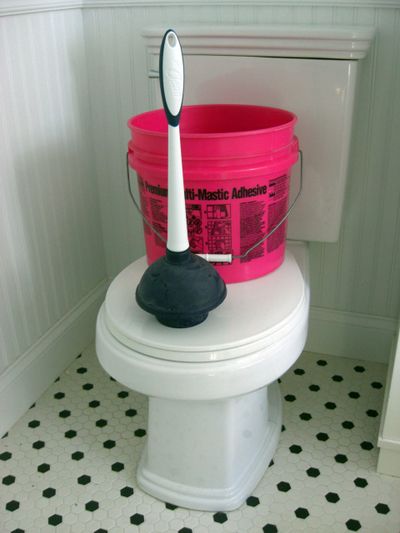 You often don’t need a plunger to unclog a toilet. Just use 3 or 4 gallons of water from a bucket. (Tim Carter)