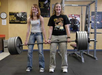 
Anna Cade and Jennifer Otto, both 17, and seniors in the Home Link Program through Deer Park School District, won their categories at the World Association of Benchers and Deadlifters competition in Anaheim, Calif., in November. 
 (Dan Pelle / The Spokesman-Review)