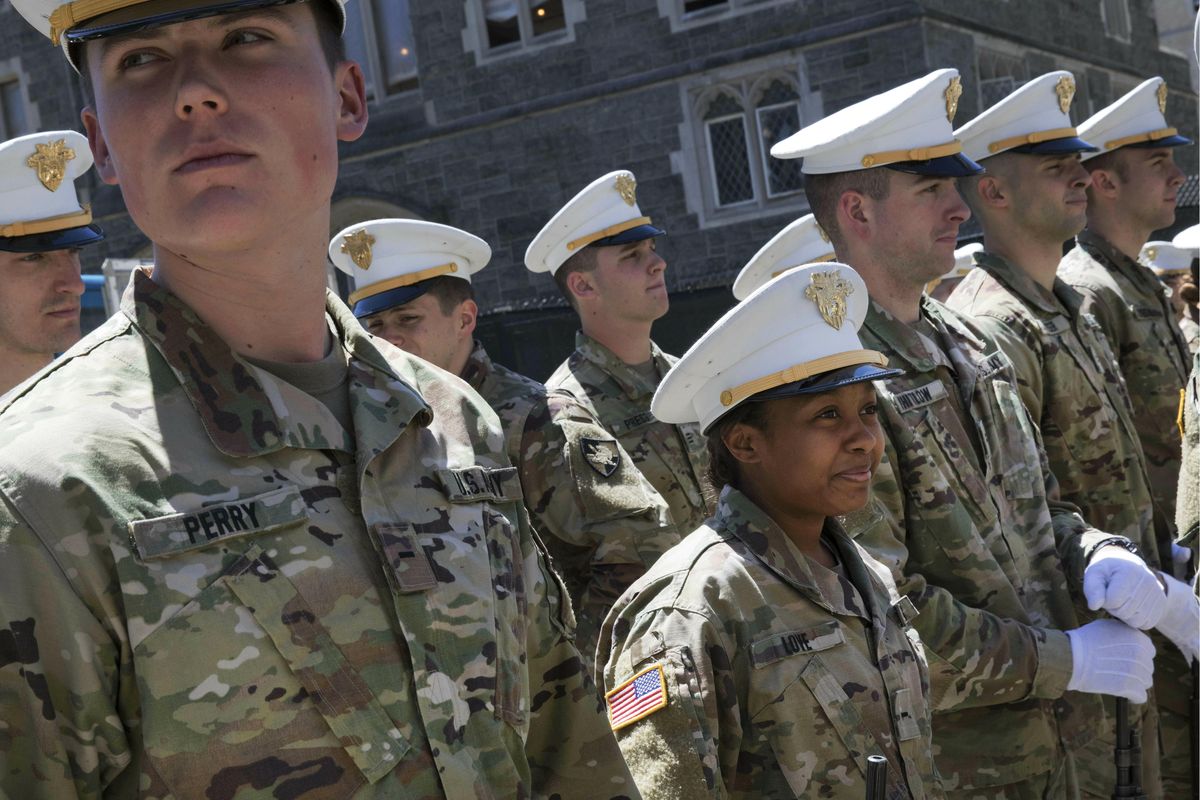 In this May 22, 2019 photo Briana Love, center, and fellow underclassmen prepare to drill at the U.S. Military Academy in West Point, N.Y. The class graduating on Saturday, May 25, will include 223 women, the largest number since the first female cadets graduated in 1980. It will include 117 African-Americans, more than double the number from 2013, and the largest number of Hispanics, 88. (Mark Lennihan / Associated Press)