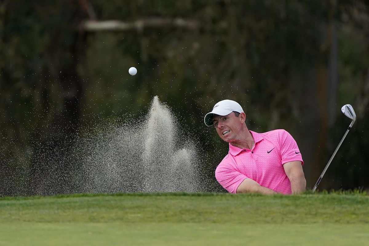 Rory McIlroy, of Northern Ireland, hits out of a bunker to the 13th green on the South Course during the final round of the Farmers Insurance Open golf tournament at Torrey Pines, Sunday, Jan. 31, 2021, in San Diego.  (Associated Press)