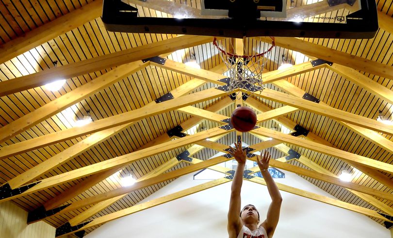 Post Falls senior Connor Hill has honed his shooting touch by practicing in his family’s private gymnasium. (Kathy Plonka)