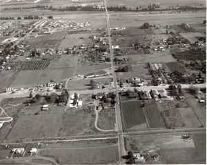 An aerial view of the corner of Sprague and Sullivan looking north, taken in 1965. Photo courtesy Spokane Valley Heritage Museum.
 (Photo courtesy the Spokane Valley Heritage Museum)