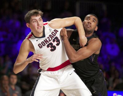 Gonzaga's Kyle Wiltjer fights for a rebound against Washington's Devenir Duruisseau in the Battle 4 Atlantis tournament in the Bahamas. (Logan Reidsma / Special to The Spokesman-Review)