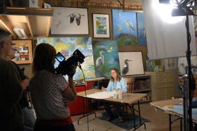 
Mobley talks with HGTV directors and a producer before taping her segment of 