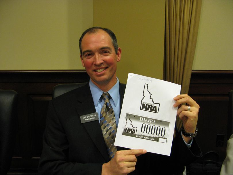 New Idaho Rep. Sage Dixon, R-Ponderay, with a mockup of his proposed new 