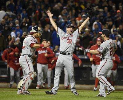 Max Scherzer, center, celebrates after fanning 17, throwing his second no-hitter of season. (Associated Press)