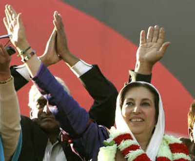 
Former Pakistan Prime Minister Benazir Bhutto waves to her supporters Thursday during her last public rally in Rawalpindi, Pakistan. Associated Press
 (Associated Press / The Spokesman-Review)