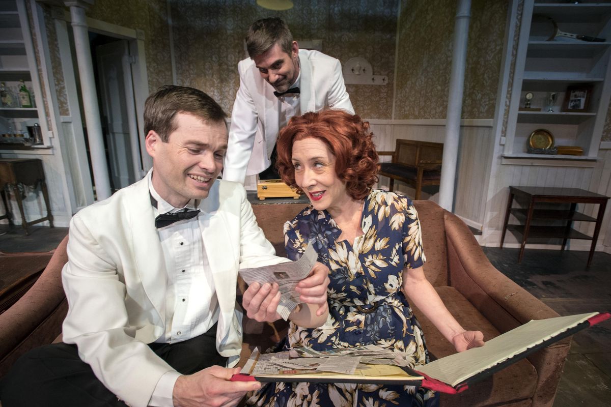 Actors (on couch) Andrew Biviano (Max Halliday), Molly Allen (Margot Wendice) and Patrick McHenry-Kroetch play a scene from Spokane Civic Theatre’s production of “Dial M for Murder.” (Colin Mulvany / The Spokesman-Review)