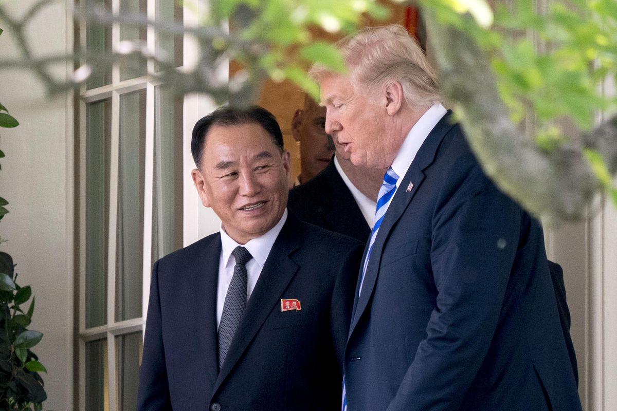 President Donald Trump talks with Kim Yong Chol, former North Korean military intelligence chief and one of leader Kim Jong Un’s closest aides, as they walk from their meeting in the Oval Office of the White House in Washington, Friday, June 1, 2018. (Andrew Harnik / Associated Press)