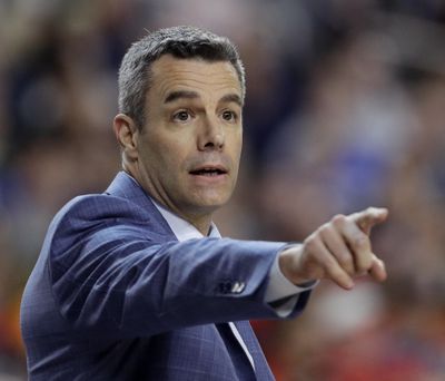 In this Monday, April 8, 2019 photo, Virginia head coach Tony Bennett directs his team during the first half against Texas Tech in the championship game of the Final Four NCAA college basketball tournament in Minneapolis. Tony Bennett’s first offseason as a national champion coach has come with benefits on the recruiting trail. His first season at Virginia after winning the title, however, will bring challenges. (David J. Phillip / Associated Press)