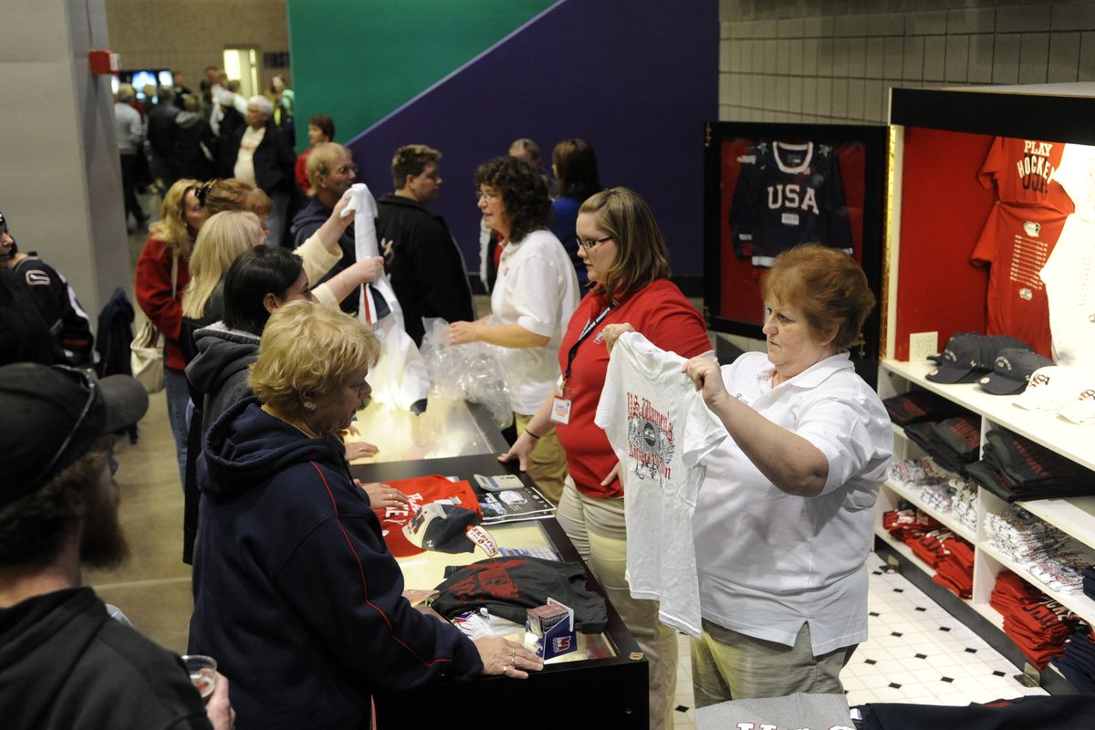 Fans line up to buy U.S. women’s hockey merchandise Friday at the Spokane Arena. jesset@spokesman.com. (Jesse Tinsley jesset@spokesman.com. / The Spokesman-Review)