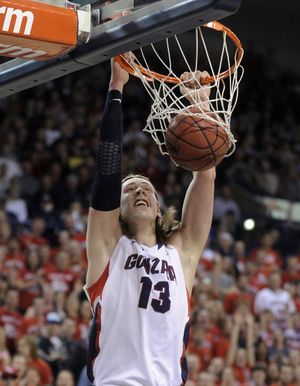 Gonzaga's Kelly Olynyk dunks home two of his team-high 31 points. The junior also had eight rebounds. (Colin Mulvany)