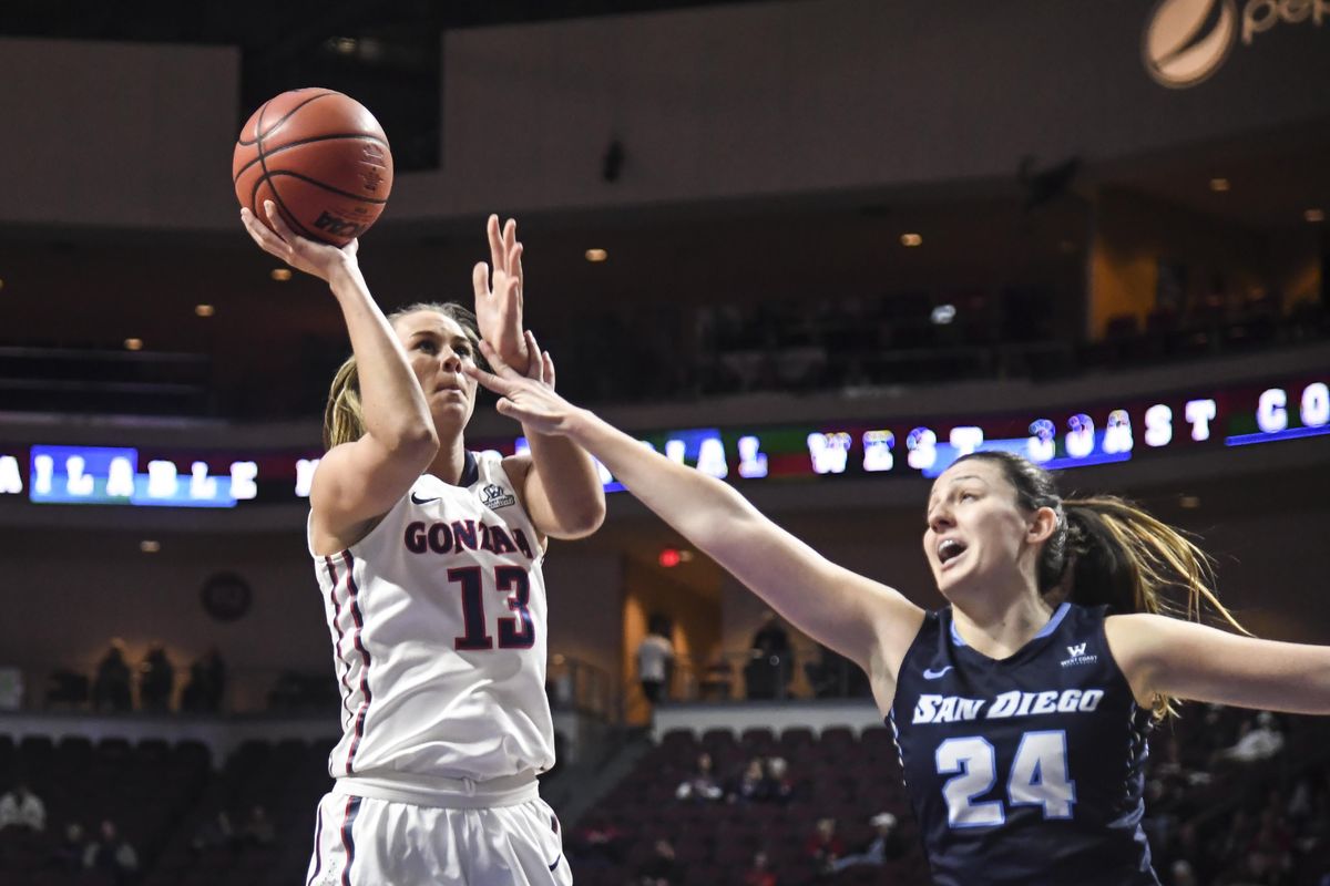 Gonzaga forward Jill Barta (13) hits a shot over San Diego forward Caroline Buhr (24), Tuesday, March 6, 2018, at the Orleans Arena in Las Vegas. (Dan Pelle / The Spokesman-Review)