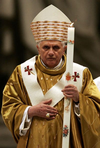 
Pope Benedict XVI holds a candle during the Easter Vigil ceremony Saturday. 
 (Associated Press / The Spokesman-Review)