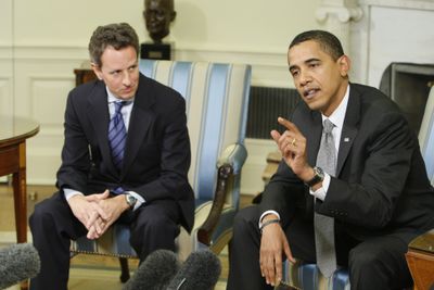 President Obama speaks about the economy Thursday as Treasury Secretary Tim Geithner looks on in the Oval Office of the White House.  (Associated Press / The Spokesman-Review)