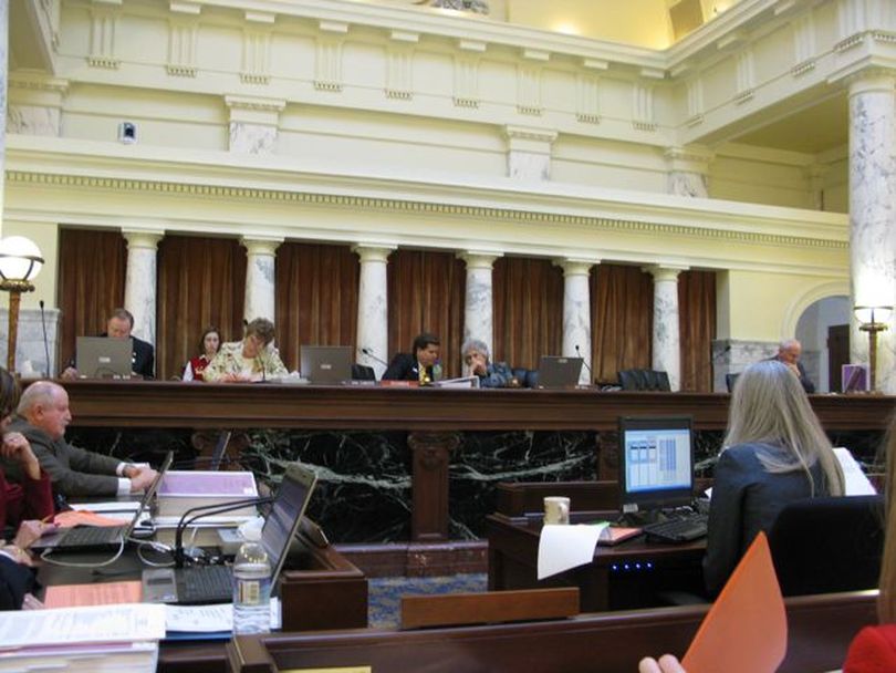 Sen. Bert Brackett, R-Rogerson, lower left, proposed the successful budget Tuesday morning for community colleges, which reflects a 9.2 percent cut in state general funds and a 12.6 percent reduction overall from this year's level. The move came as the Joint Finance-Appropriations Committee set budgets for higher ed for next year. (Betsy Russell)