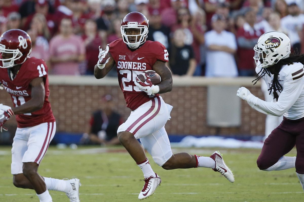 In this Sept. 10, 2016, file photo, Oklahoma running back Joe Mixon (25) carries during an NCAA college football game against Louisiana Monroe, in Norman, Okla. (Sue Ogrocki / Associated Press)