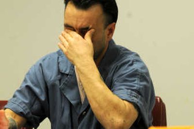 
Julio Davila wipes away tears while talking about his children during Engaging Fatherhood class at the Spokane County. 
 (Rajah Bose / The Spokesman-Review)