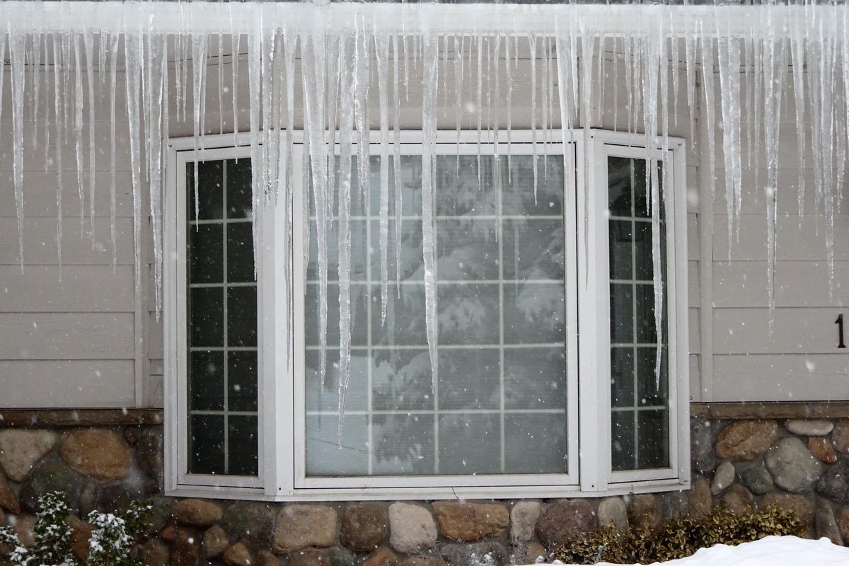 Icicles hang on a South Hill home on Jan. 10, 2017. The region received back-to-back arctic blasts in early January, plunging the mercury to minus 4 degrees on Jan. 12 and 14. (Jesse Tinsley / The Spokesman-Review)
