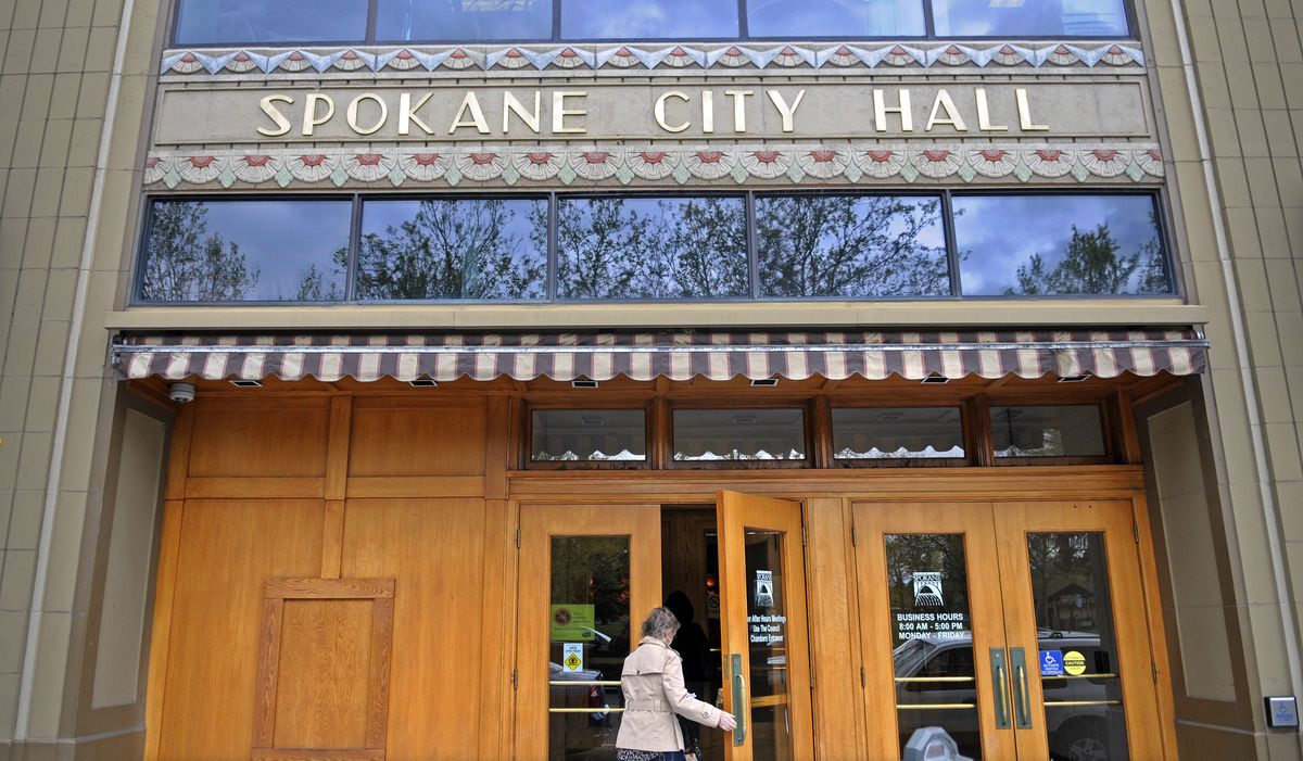 Visitors to Spokane City Hall enter through the Post Street doors Thursday May 26, 2011.  There is a consideration before the City Council to upgrade the security of the buidling. (Christopher Anderson / The Spokesman-Review)