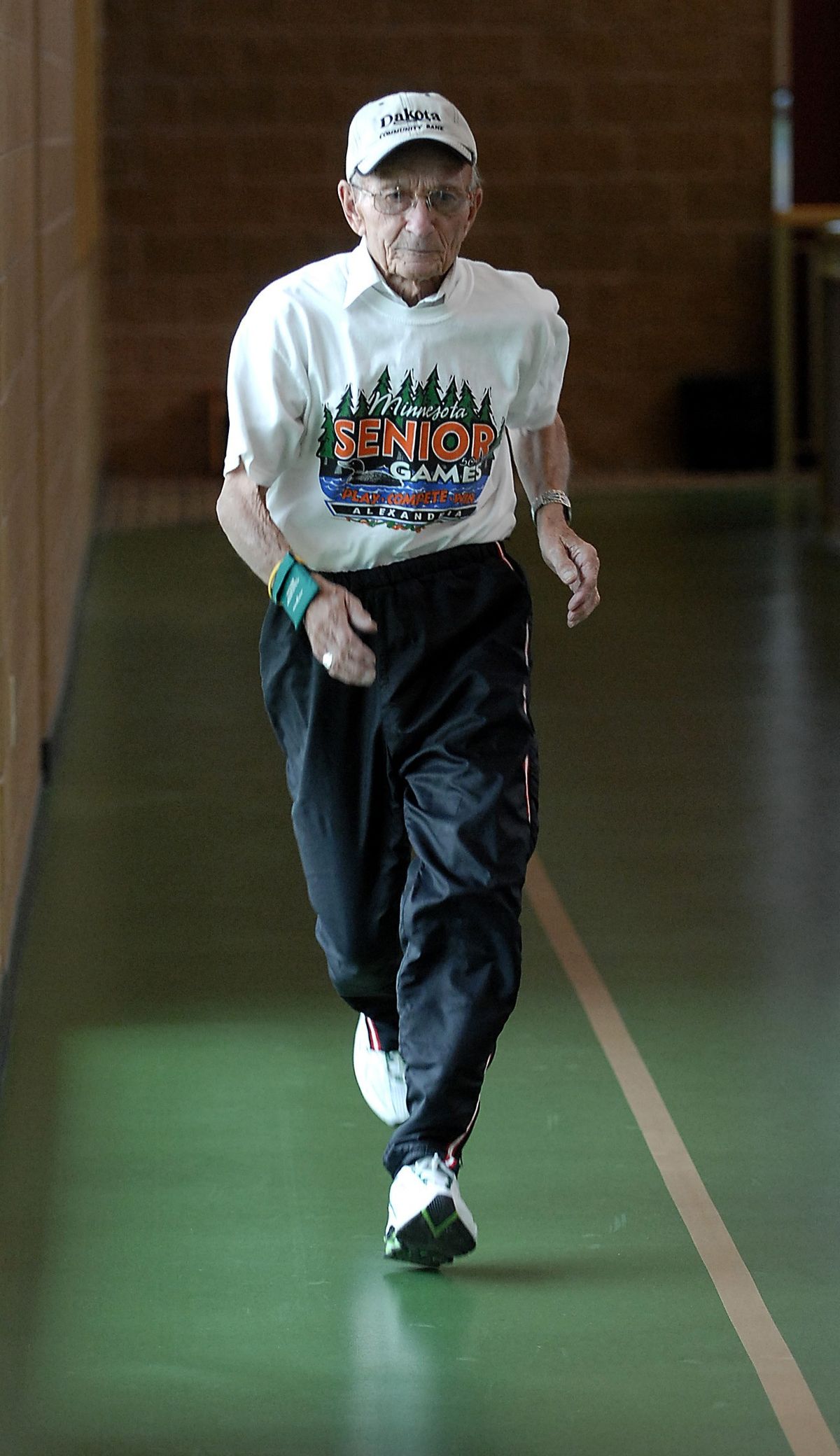 Harold Bach jogs around the track at the West River Community Center in Dickinson, N.D., on June 15.  (Associated Press / The Spokesman-Review)