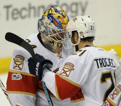 Florida Panthers’ goalie James Reimer, left, is congratulated by teammate Vincent Trochck (21) after their 2-1 victory over the St. Louis Blues in an NHL hockey game, Monday, Feb. 20, 2017, in St. Louis. (Bill Boyce / Associated Press)