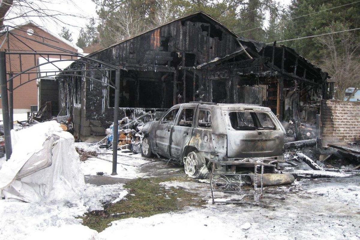 This Newman Lake home at 12611 N. East Newman Lake Drive was completely destroyed by fire just after 1 a.m. on Tuesday, Jan. 24.  (Photo courtesy the Spokane Valley Fire Department)