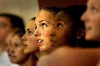 Angela Hartill, center, of Riverside High, listens to coaching instructions with her teammates during a Stars practice Tuesday. The team has several national tournaments coming up.
(Brian Plonka / The Spokesman-Review)