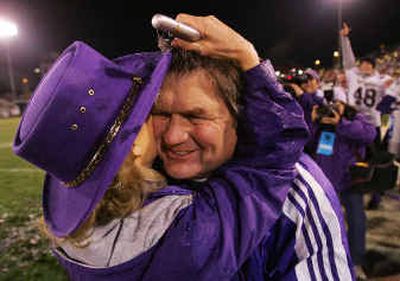 James Madison head coach Mickey Matthews gets a hug from his wife Kay as they celebrate the Division I-AA national title.
(Associated Press / The Spokesman-Review)