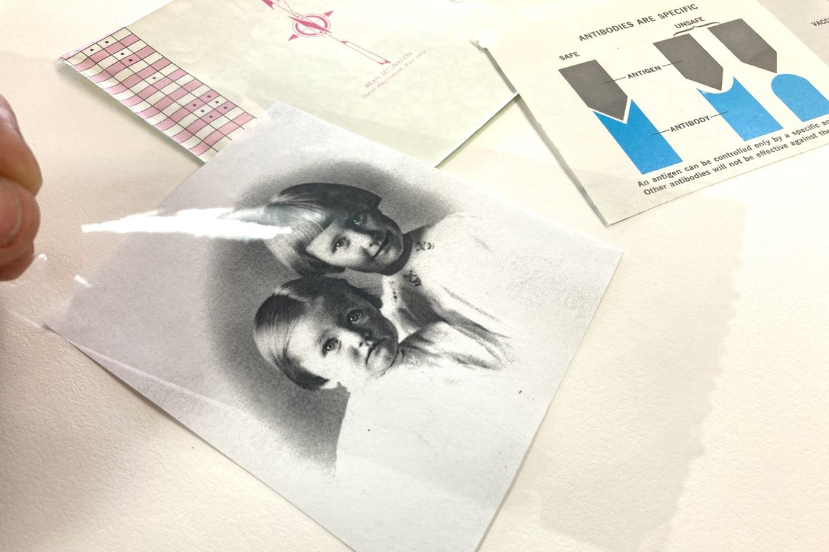Place packing tape on the image you wish to transfer, then soak it to remove the paper.  (Katie Patterson Larson/For The Spokesman-Review)