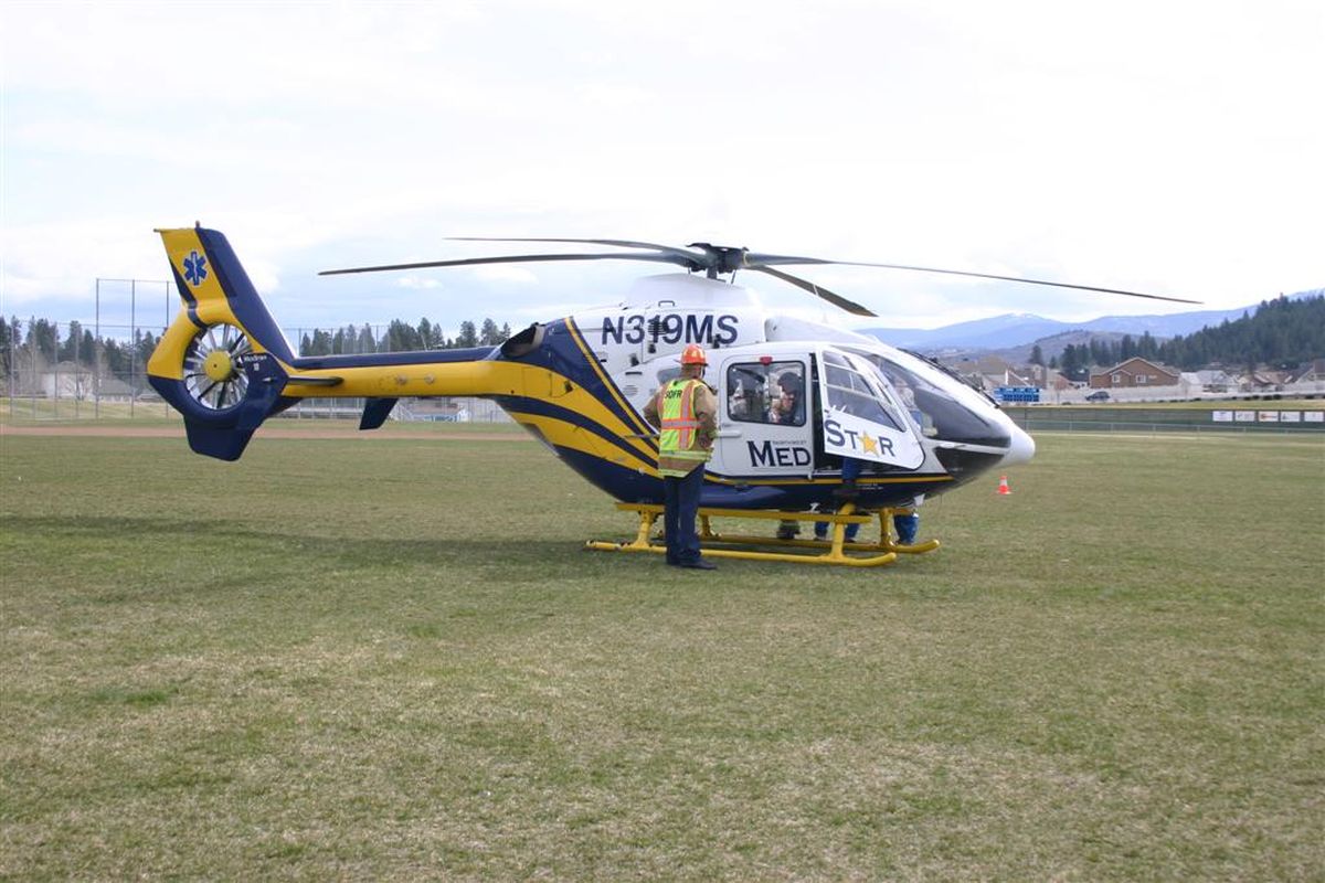Central Valley High School students and emergency responders participate in a mock crash staged April 14, 2011 to warn students of the dangers of drinking and driving. (Photo courtesy Spokane Valley Fire Department)