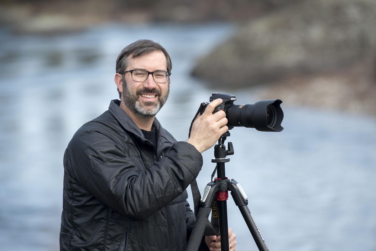 Craig Goodwin, a Presbyterian pastor, has built his hobby of photography into a busy side business. Photographed Wednesday, Mar. 7, 2018. (Jesse Tinsley / The Spokesman-Review)