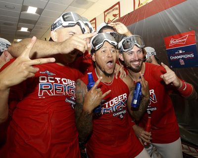 St. Louis Cardinals players celebrate their National League central division win after defeating the Chicago Cubs, Sunday, Sept. 29, 2019, in St. Louis. (Scott Kane / Associated Press)