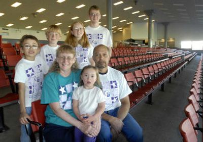 
Dianna Macklin's family will participate in the upcoming Relay for Life Friday and Saturday at the Greyhound Park. They are, from left/front row, Cody Macklin, 7, Dianna Macklin, Lori Ann Macklin, 4, and Leroy Macklin. Back row, Marc Possman, 12, Kayla Possman, 16 and Sheyne Possman, 18. The two older Possmans are part of the youth committee for the Relay for Life. 
 (Jesse Tinsley / The Spokesman-Review)